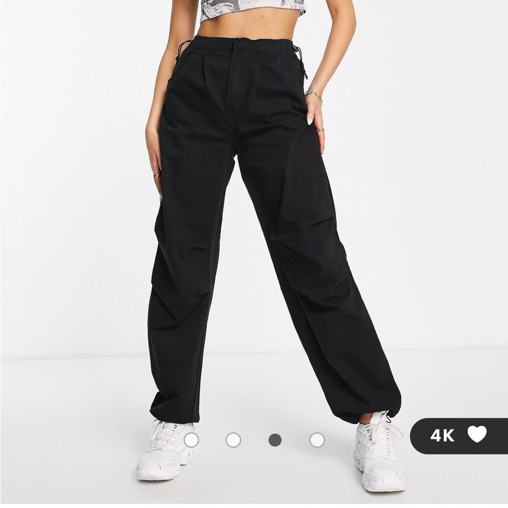 Black parachute pants